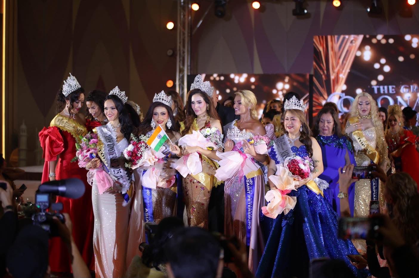Titleholders from around the world on stage together at the Mrs Universe International Finals, 2025